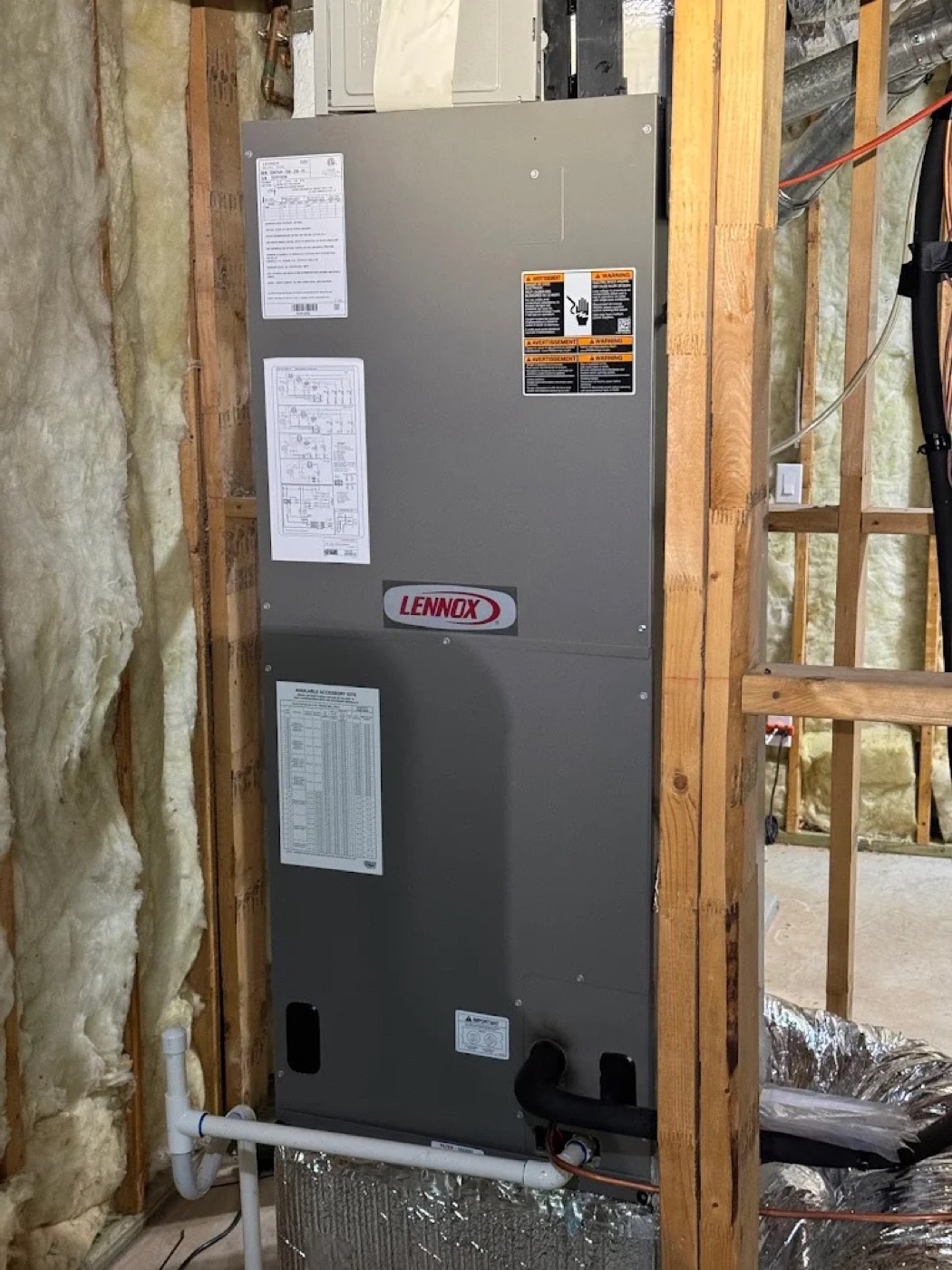 Lennox air handler installation with framing visible, installed by Dynasty
